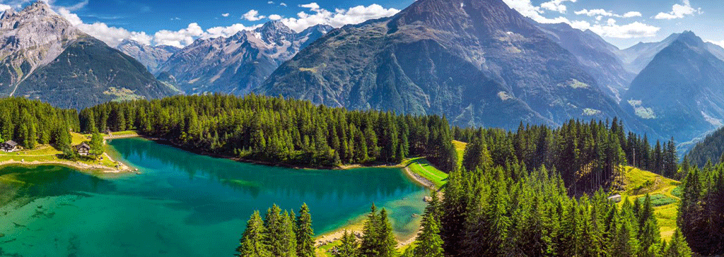 switzerland-forest-lake-mountains-blue-sky-header