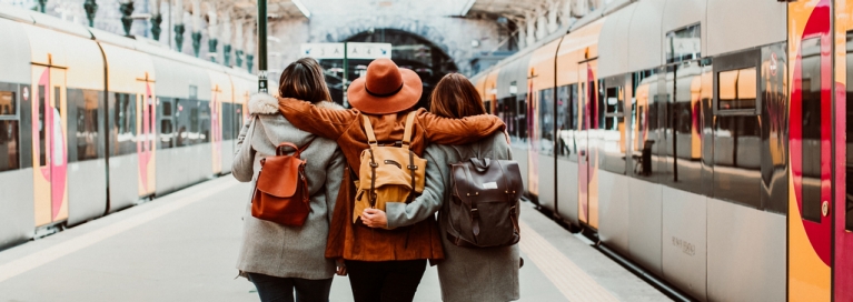 Group of friends in train station