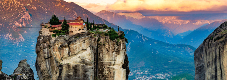 masthead-greece-meteora-panorama-buildings-on-mountains