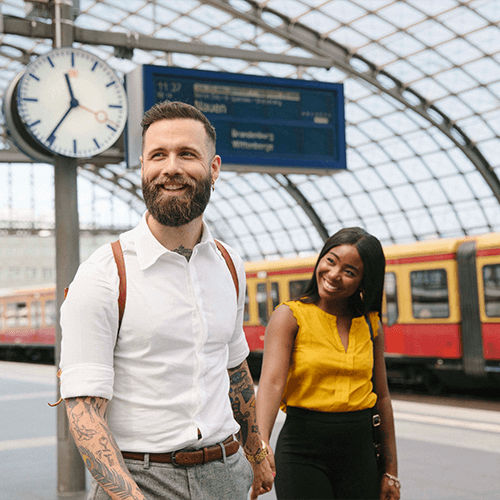 Couple waiting for a train